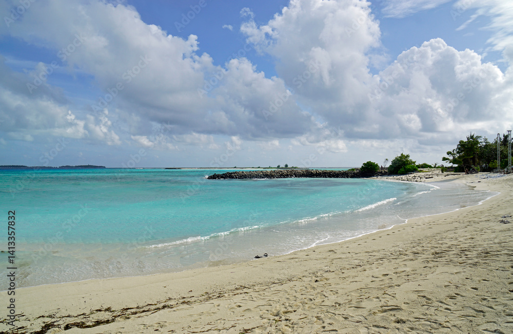 Sunny tropical beach paradise on the Maledives
