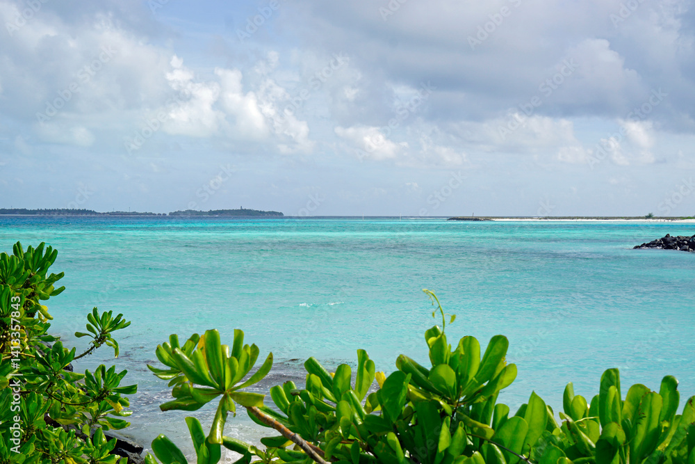 Sunny tropical beach paradise on the Maledives