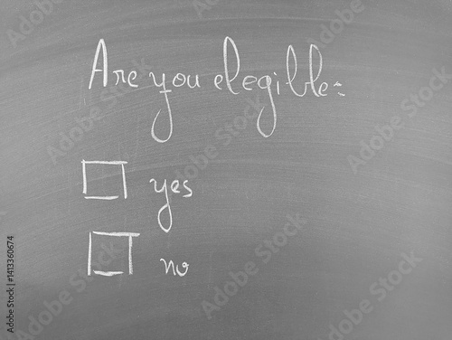 Chalkboard question: Are you eligible? Yes or No options presented.  Eligibility question on chalkboard with two checkboxes.