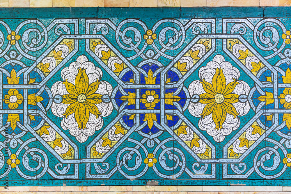 Tashkent, Uzbekistan, Central Asia. Decorative tile work in a Tashkent subway station. Tashkent, Uzbekistan, Central Asia. Decorative tile work in a Tashkent subway station.