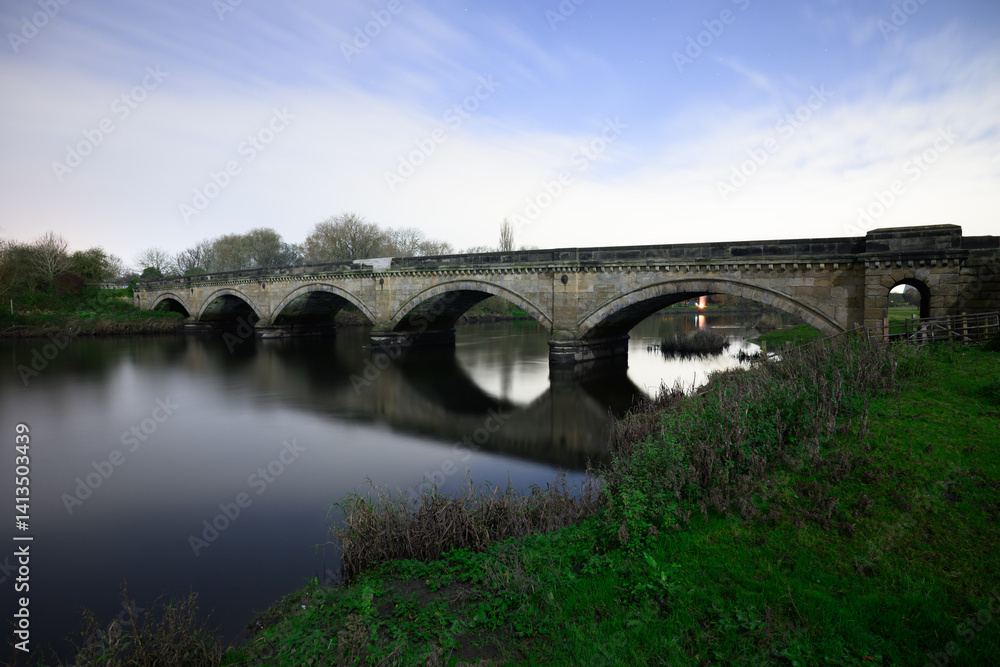 Fototapeta premium Willington Bridge Crossing the River Trent in Derbyshire