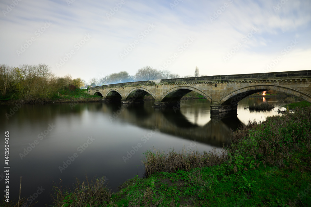 Fototapeta premium Willington Bridge Crossing the River Trent in Derbyshire