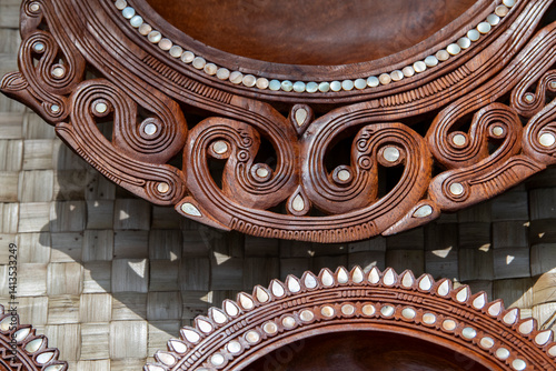 Papua New Guinea, Milne Bay Province, Kuiawa Island. Hand carved wooden bowl with shell inlay.