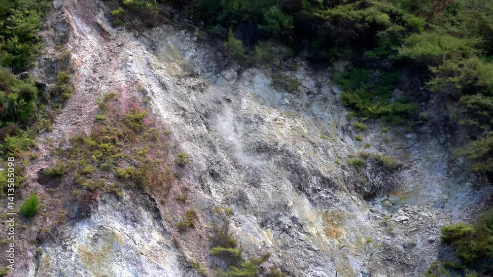 Steaming Slope in a Geothermally Active Valley – Volcanic Landscape in New Zealand Steaming Slope in a Geothermally Active Valley – Volcanic Landscape in New Zealand