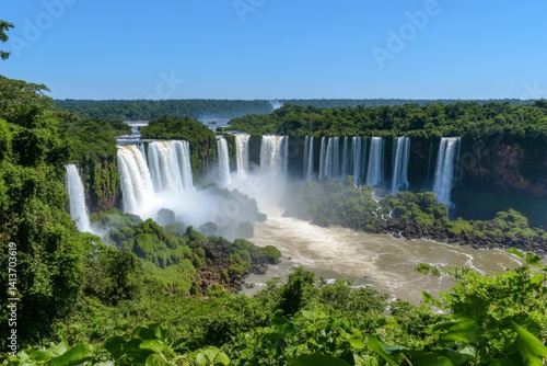 A massive waterfall at Iguazu Falls, with powerful cascades and lush green surroundings