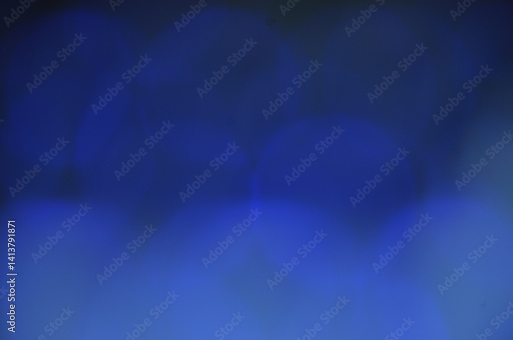 Abstract Background Featuring Soft Blue Bokeh and Gradient Lighting Abstract Background Featuring Soft Blue Bokeh and Gradient Lighting