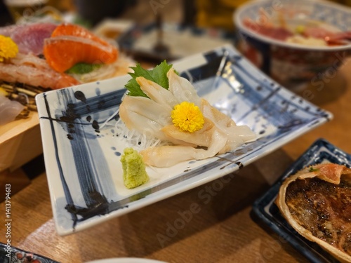 Scallop and yellow flower sashimi