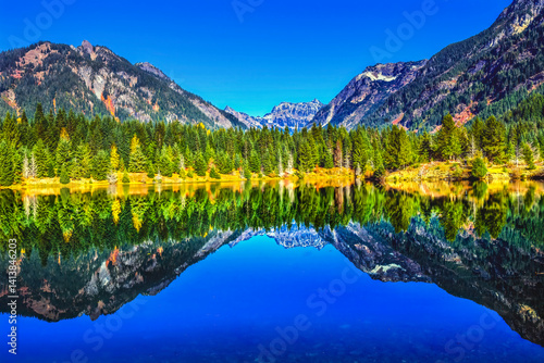 Gold Lake water reflection Mount Chikamin, Snoqualmie Pass, Wenatchee NF, Washington State, Usa.