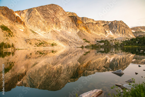 USA, Wyoming, Medicine Bow National Forest. Landscape with mountain and   Lake Marie reflection.