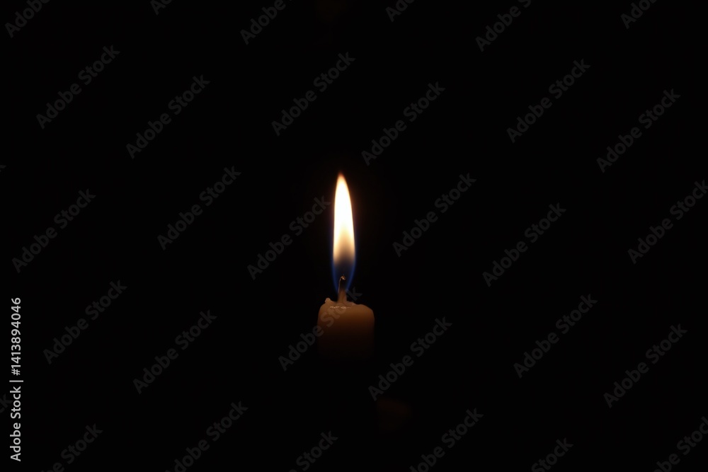 single lit candle in the dark single lit candle in the dark
