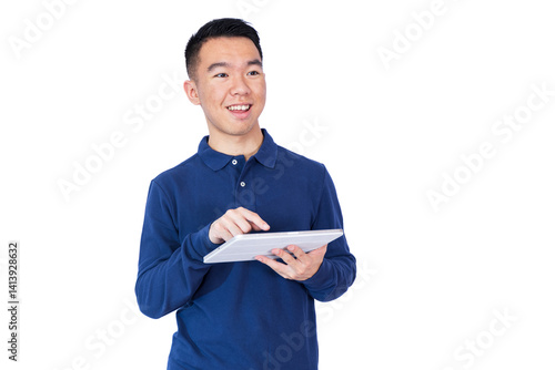 A young man in a blue long-sleeve polo shirt interacts with a tablet using his index finger. He smiles while looking off-screen. Suggests touchscreen interaction, learning, or casual tech use.