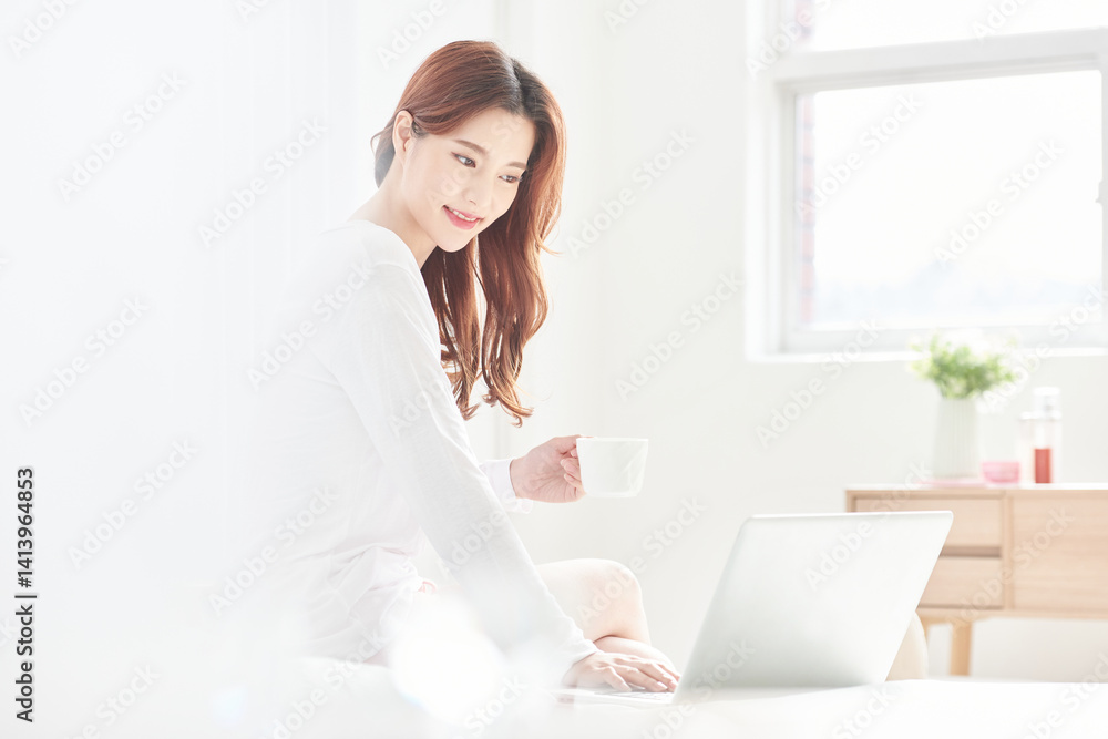 Morning Routine with Coffee and Laptop in Bright Room Morning Routine with Coffee and Laptop in Bright Room