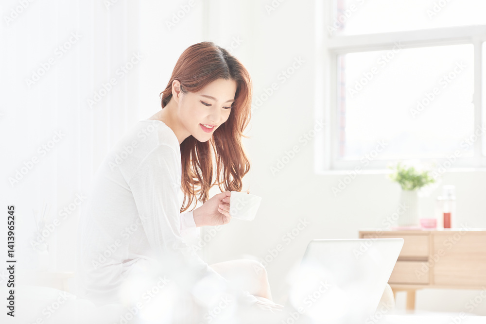 Morning Routine with Coffee and Laptop in Bright Room Morning Routine with Coffee and Laptop in Bright Room
