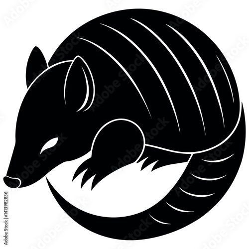 Armadillo curled up in its armored shell silhouette
