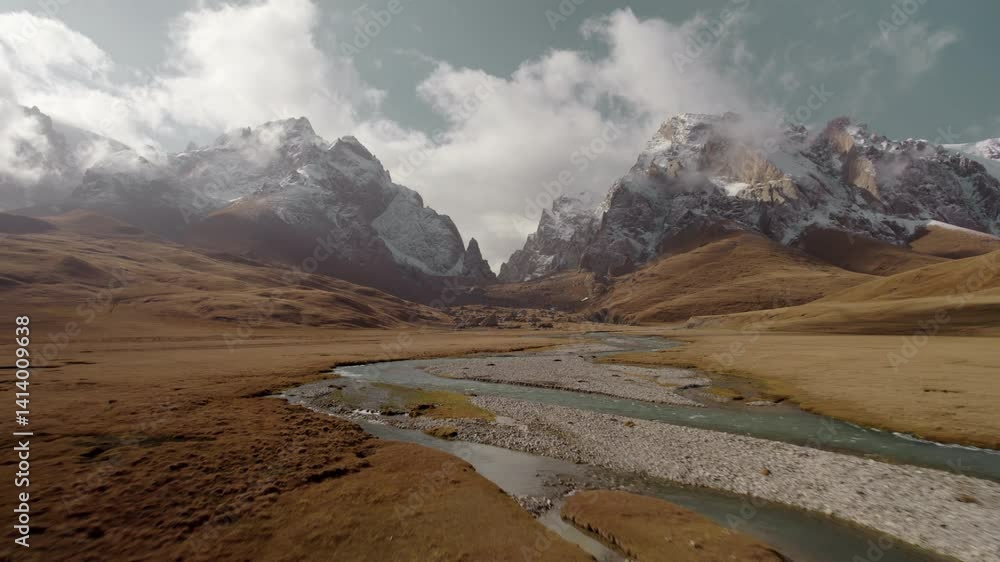 Drone flight over mountain river flowing from the Tien Shan mountains in Kyrgyzstan
