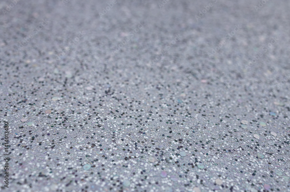 Full frame macro abstract texture background of sparkling silvery white glitter surface with copy space
Full frame macro abstract texture background of sparkling silvery white glitter surface with copy space