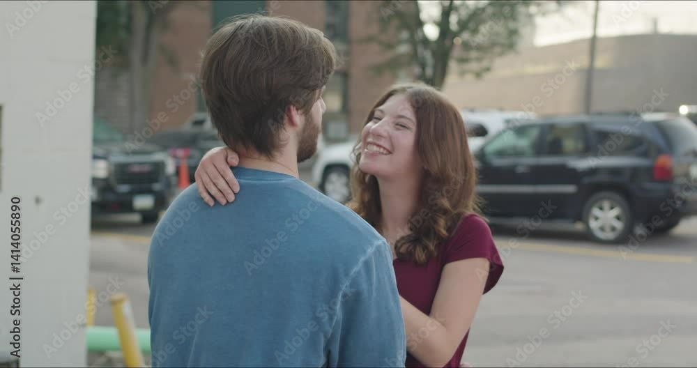 Woman laughing while embracing with man Woman laughing while embracing with man