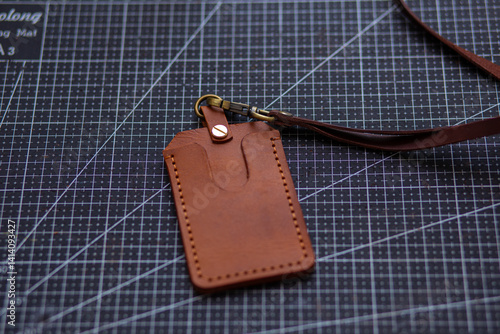 Obraz na płótnie Leather id card holder handmade object craftmanship working w salonie