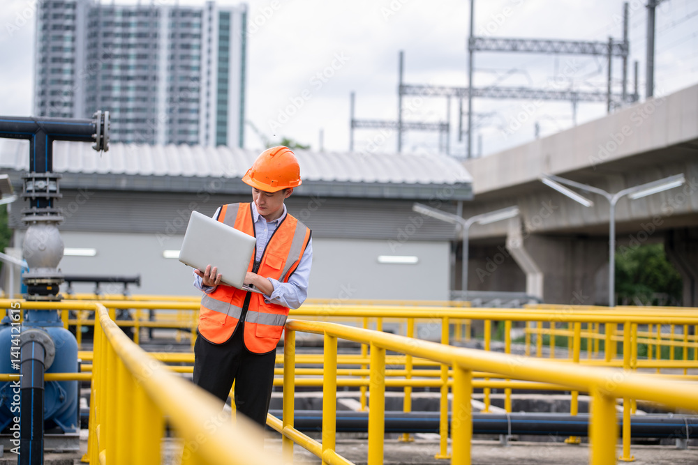 Fototapeta premium Engineer take water from wastewater treatment pond to check the quality of the water after going through program wastewater treatment process in industry environment concept.