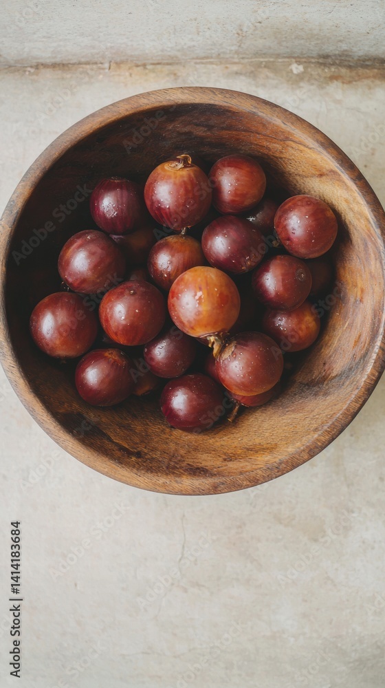 Abundant bowl overflowing with freshly picked grapes on a white background ready to enjoy Abundant bowl overflowing with freshly picked grapes on a white background ready to enjoy