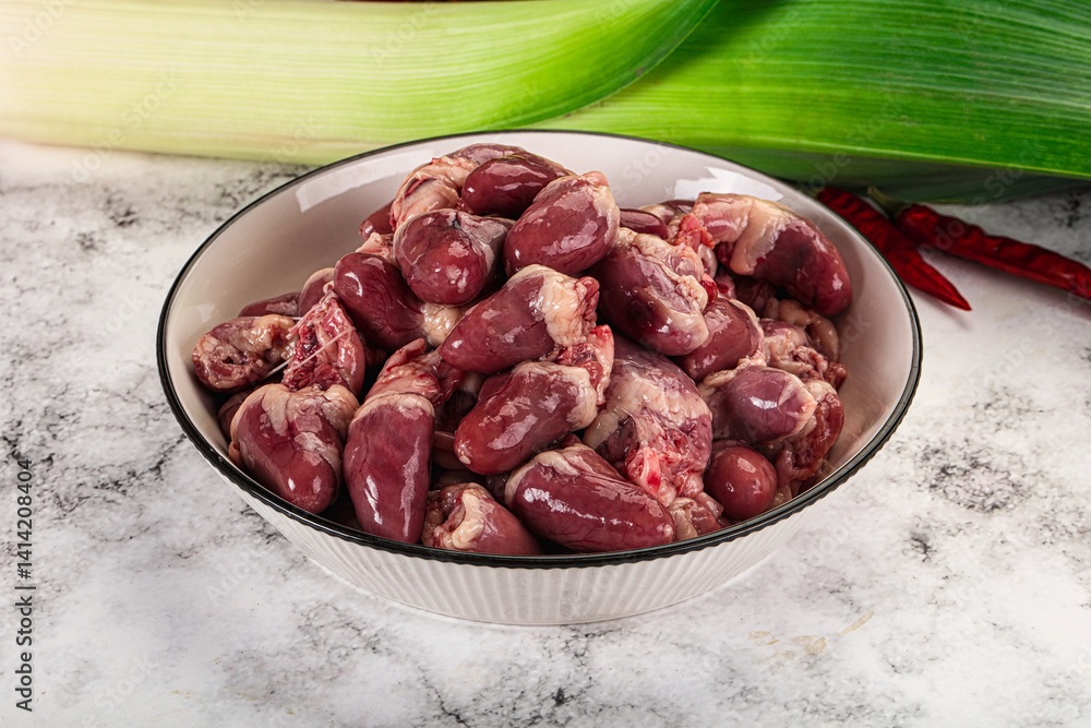 Raw chicken hearts in the bowl
