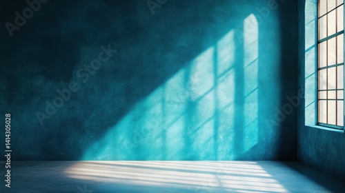 Sunlight streaming through arch window onto empty blue room with textured walls