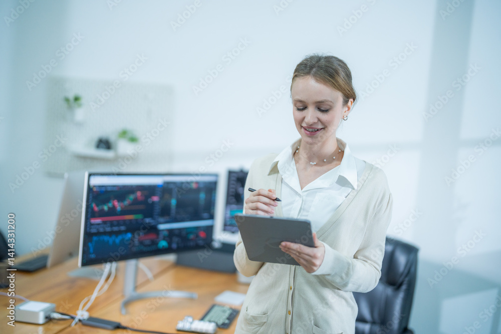 Business professional engages with digital tablet in modern office environment while reviewing data and analytics Business professional engages with digital tablet in modern office environment while reviewing data and analytics