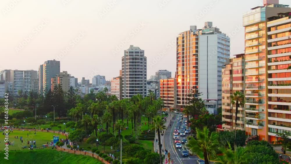 Sunset view of Miraflores skyline with traffic and park in Lima, Peru from above Sunset view of Miraflores skyline with traffic and park in Lima, Peru from above