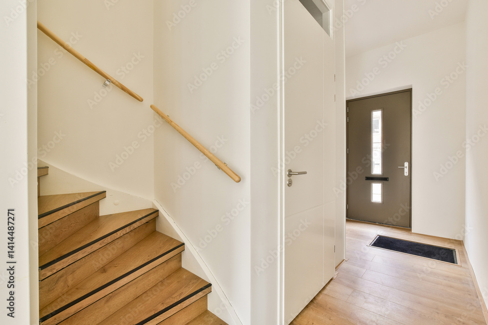 A stylish interior view showcasing a modern staircase and entrance. The design features clean lines, light colors, and minimalistic elements, enhancing the inviting atmosphere. A stylish interior view showcasing a modern staircase and entrance. The design features clean lines, light colors, and minimalistic elements, enhancing the inviting atmosphere.