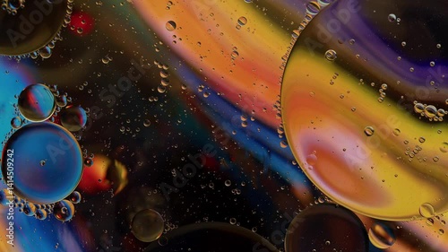 Colorful Oil Bubbles Moving on a Water Surface