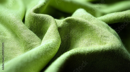 Obraz na płótnie A close-up of softly crumpled, vibrant green fabric with a textured surface, capturing the essence of tactile material beauty. w salonie