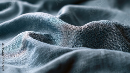 Obraz na płótnie Soft blue fabric drapes in gentle waves, creating a sense of elegance and tranquility with its textured folds and soothing color palette. w salonie