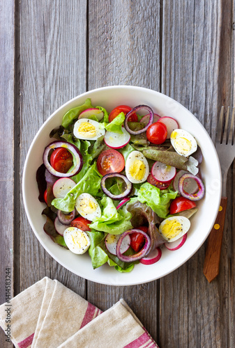 Принти на полотні Salad with eggs, tomatoes, onions and radishes