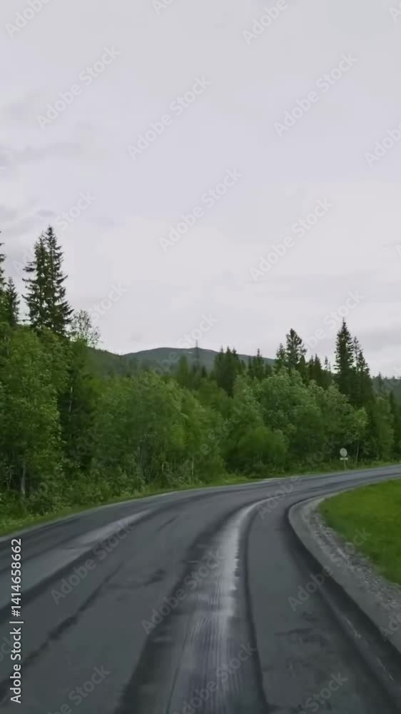 Vertical view of Norway road from car Vertical view of Norway road from car