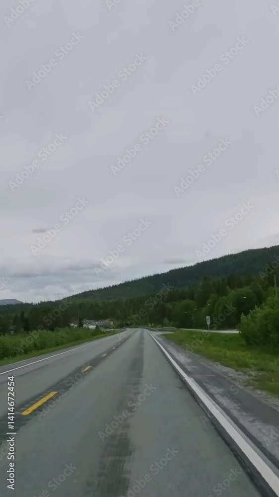 Vertical view of Norway road from car Vertical view of Norway road from car