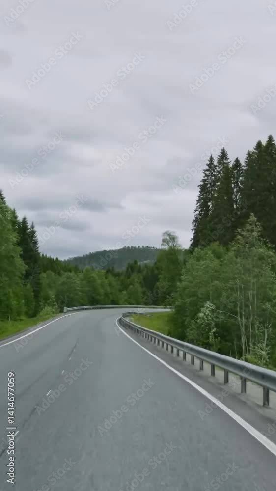 Vertical view of Norway road from car Vertical view of Norway road from car
