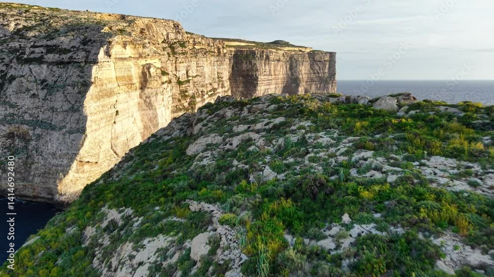 Aerial view of the stunning cliffs and lush landscape of Malta showcasing natural beauty and coastal charm Aerial view of the stunning cliffs and lush landscape of Malta showcasing natural beauty and coastal charm