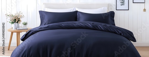 Obraz na płótnie Close-up view of smooth blue silk satin bed sheets highlighting their sheen and softness in a cozy, stylish bedroom ambiance. w salonie