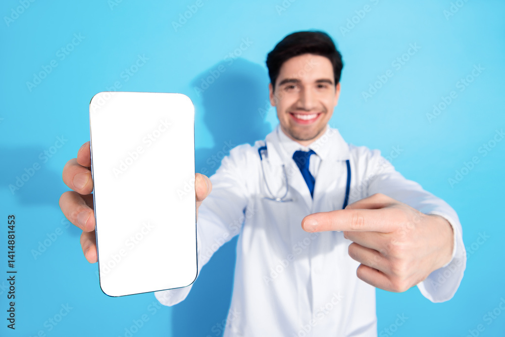 Healthcare professional showing a smartphone with a blank screen on a blue background, emphasizing technology in modern medical practices. Healthcare professional showing a smartphone with a blank screen on a blue background, emphasizing technology in modern medical practices.