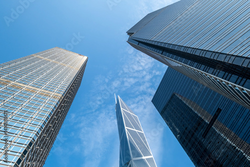 Skyline view of modern skyscrapers under a clear blue sky