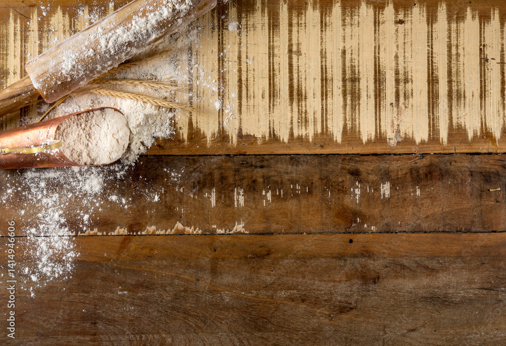 rolling pin , flour and wheat on the russtic wooden table with Free space for text, top view, copy space rolling pin , flour and wheat on the russtic wooden table with Free space for text, top view, copy space