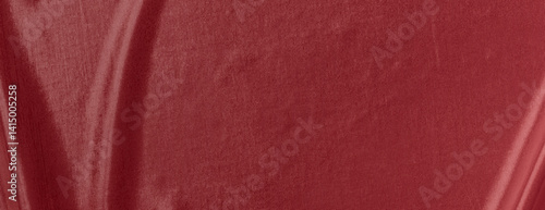 Red velvet background with a smooth texture. The background is rich red, creating a luxurious and elegant atmosphere. Minimal fabric vector background, simple fabric texture wallpaper