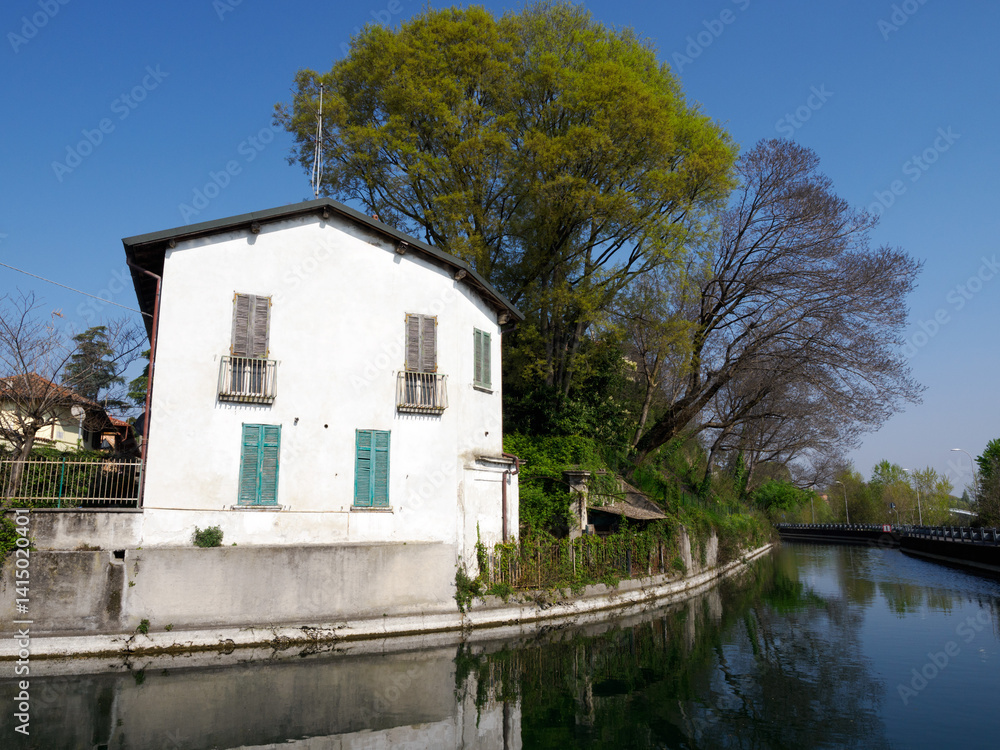 Old buildings along the canal Martesana at Vaprio, Italy
