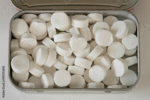 Curiously Strong Breath Mints in a Tin