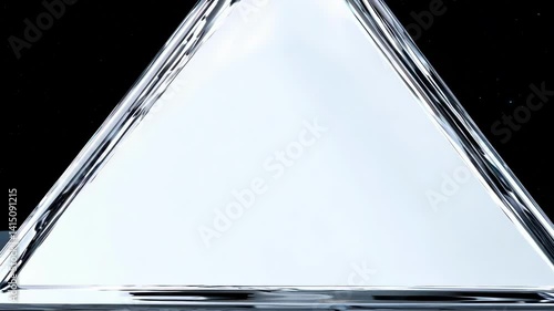 Abstract white crystal triangle shape rotating against black background with smooth movements The geometric form gradually changes position reflecting light on its edges creating dynamic visual effect