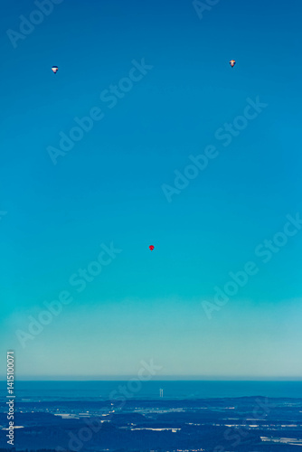 Obraz na płótnie Alpine winter view with many hot air balloons at Bad Kohlgrub, Garmisch-Partenkirchen, Bavaria, Germany w salonie