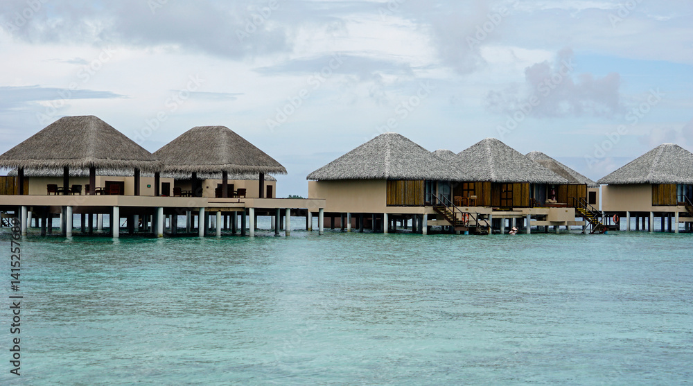 water villas on a exotic maldives island water villas on a exotic maldives island
