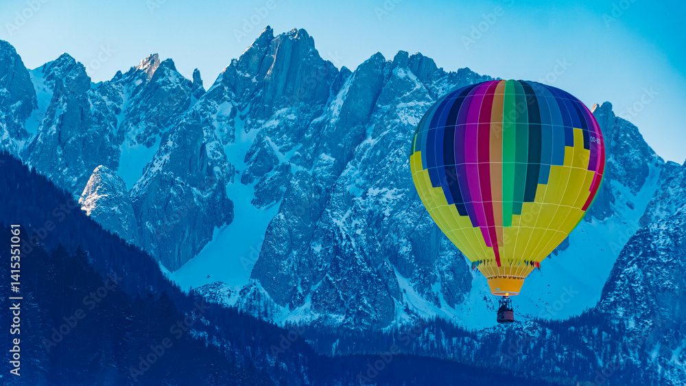 Alpine winter view with hot air balloons at Gosau, Abtenau, Salzkammergut, Salzburg, Austria