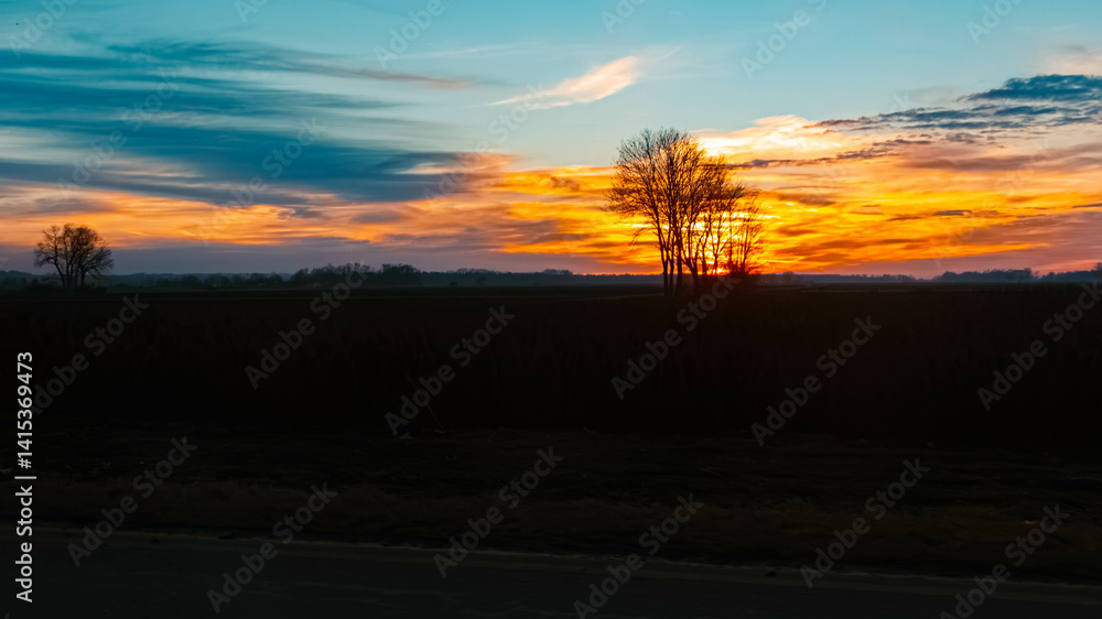 Fototapeta premium Sunset with dramatic clouds near Wallersdorf, Dingolfing-Landau, Bavaria, Germany