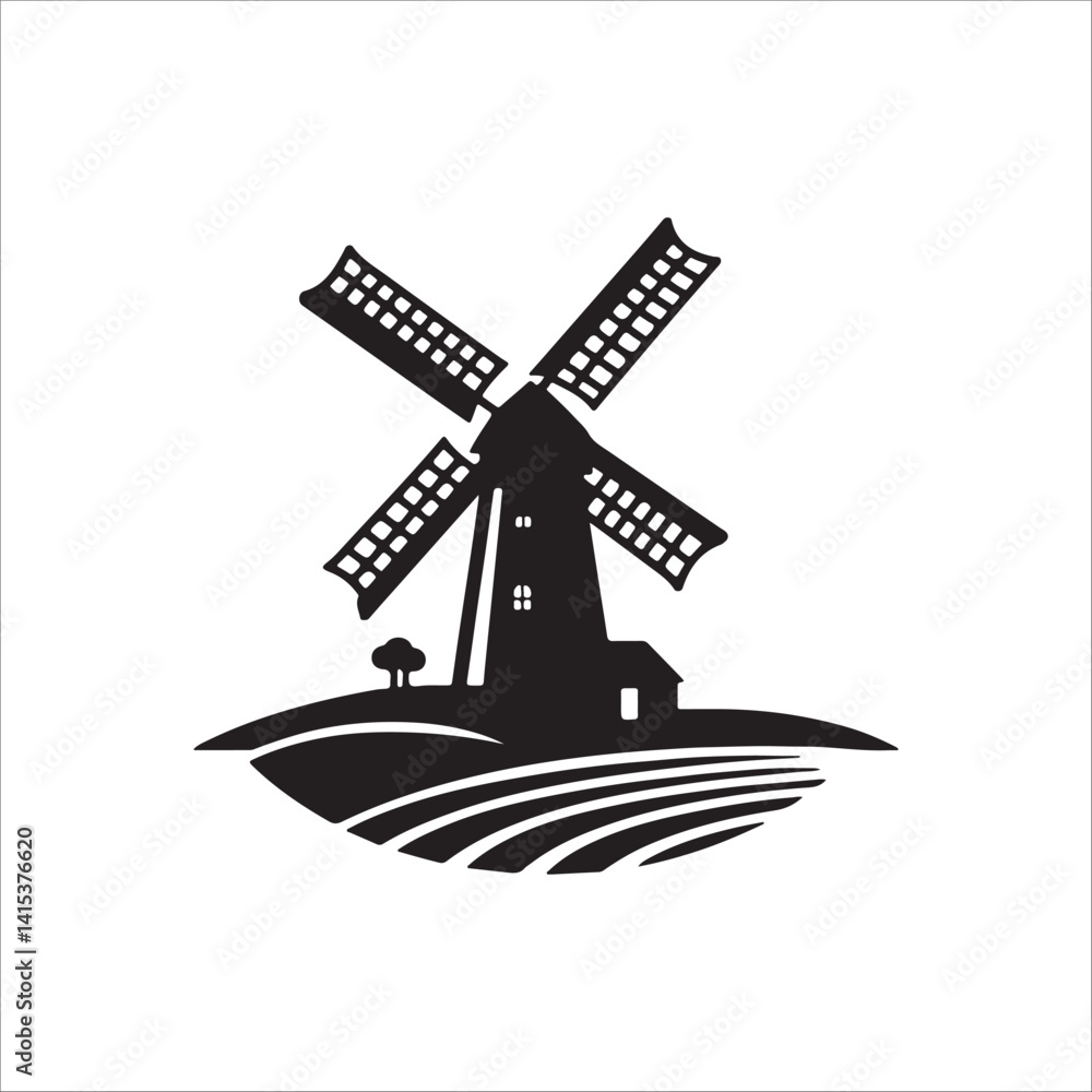 Fototapeta premium Silhouette of a Windmill in the Countryside